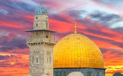 Sunrise above golden dome of Rock Mosque on Temple Mount in old city of Jerusalem.