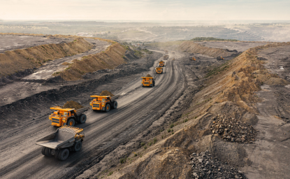 Dump trucks leaving a quarry