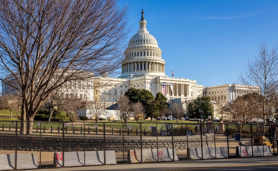 Capitol building behind barricades